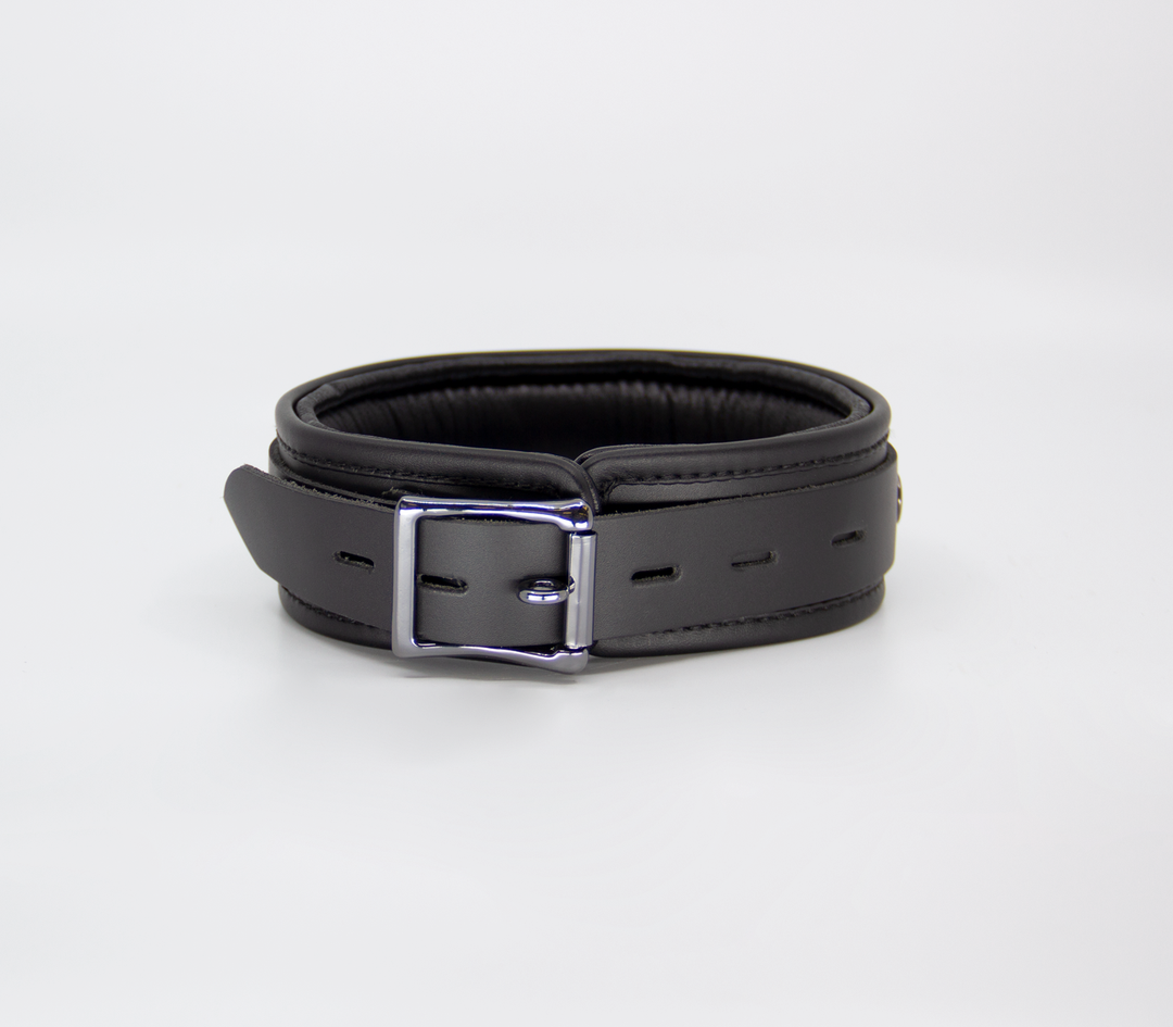 Premium leather collar close-up - showing pewter buckle detail and leather texture