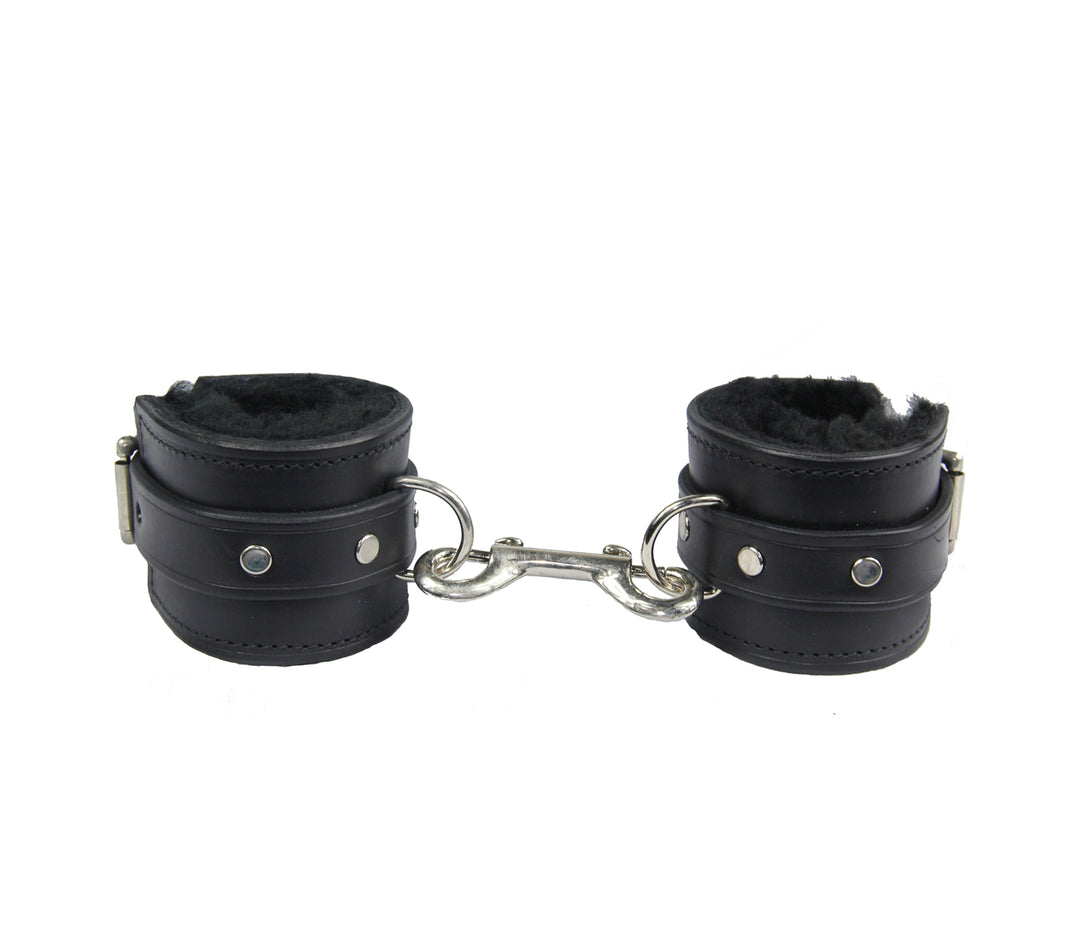 Love in Leather sheepskin cuffs - thick leather BDSM restraints with natural sheepskin interior