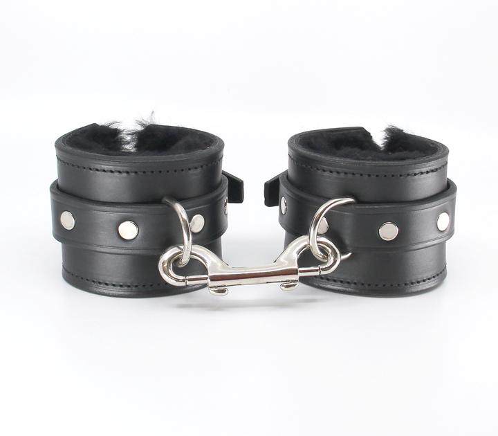 Heavy sheepskin lined cuffs close-up - showing comfortable sheepskin padding and buckle detail