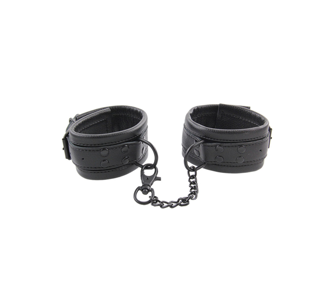 Love in Leather padded soft black cuffs - comfortable wrist restraints with chain connection