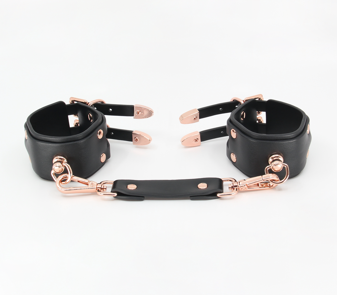 Double strap cuffs with rose gold hardware - elegant BDSM restraints with dual buckles