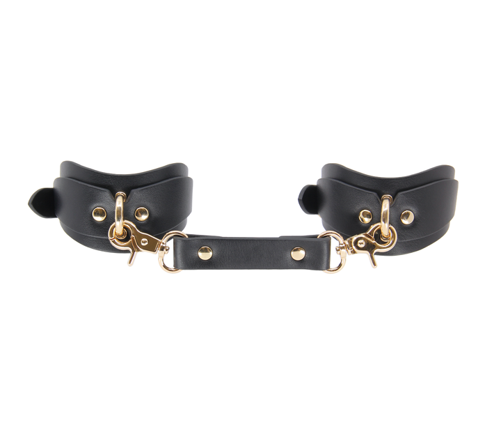 Love in Leather shaped wrist cuffs with gold hardware - ergonomic leather BDSM restraints