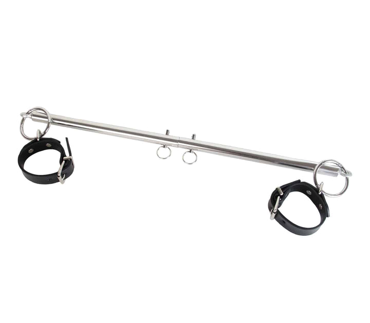 Adjustable spreader bar close-up - showing extendable mechanism and ring attachment points for bondage play
