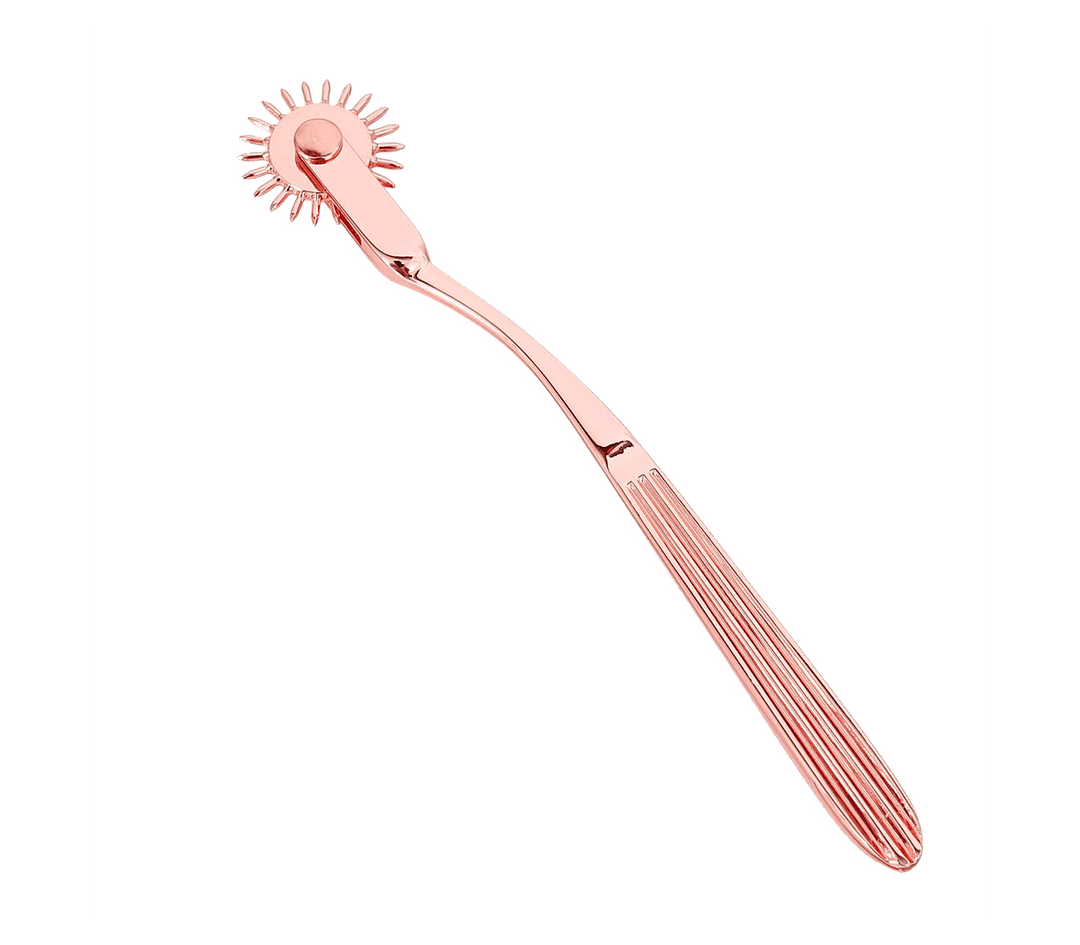 Love in Leather Wartenberg pinwheel in rose gold - medical grade sensation play wheel with sharp pins